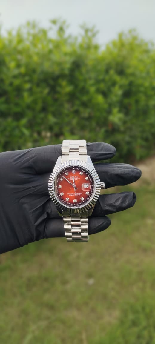 Rolex Silver with Red Dial